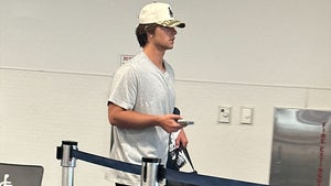 0623-Britney-Spears-Son-Sean-Preston-Federline-Airport-To-Zurich-PRIMARY