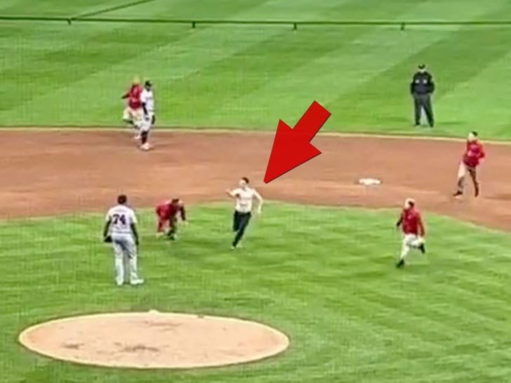 Shirtless MLB Fan Runs Wild On Field During Brewers Game, Jukes Security Guards.jpg