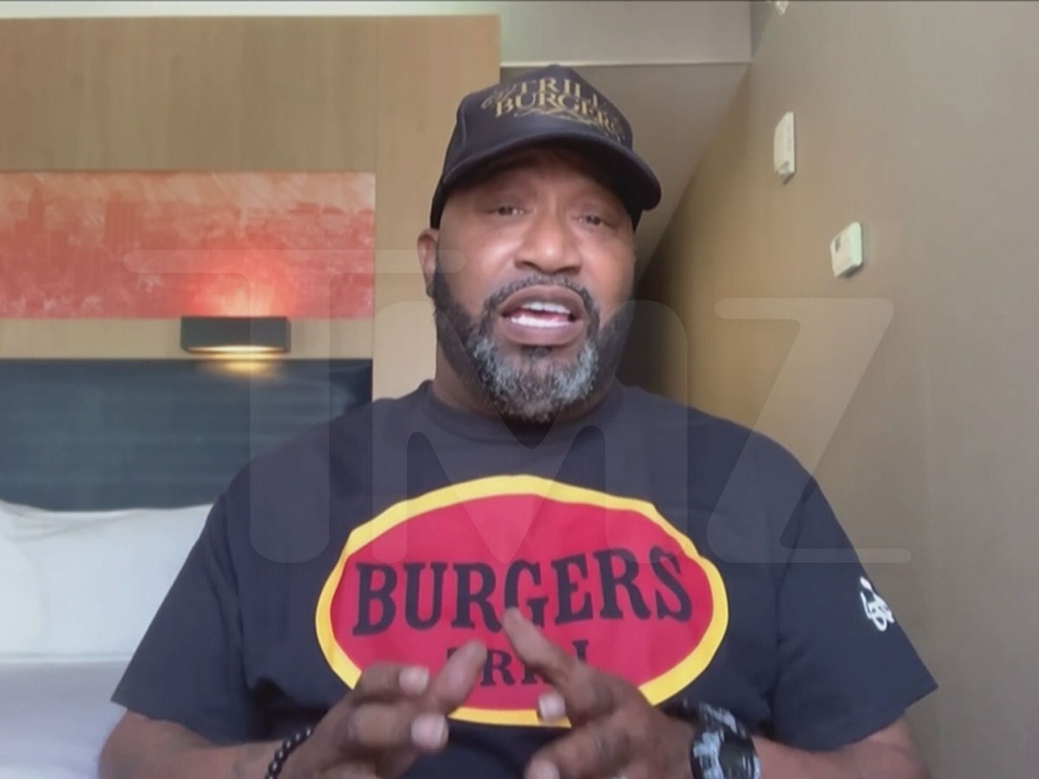 Bun B Hawking Award Winning Trill Burgers at First Ever Hip Hop Food Court