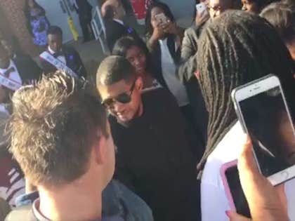 103015_usher_hillary_primary