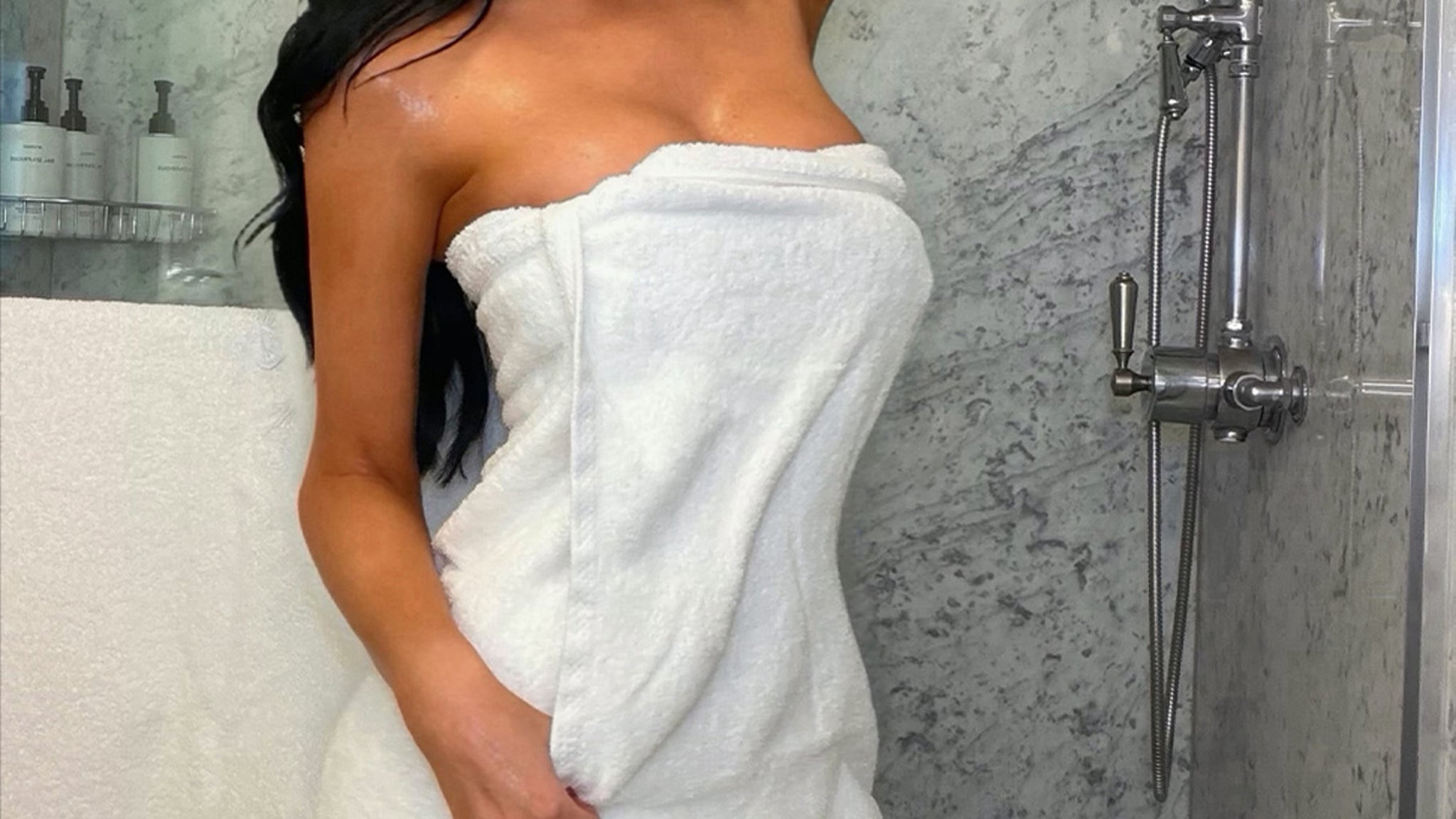 Guess The Babe Wrapped In A Towel!