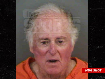 0207-warner-wolf-mug-shot-tmzsports