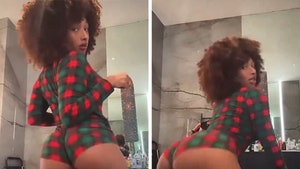 Megan Thee Stallion Twerks Up a Storm in Skimpy Christmas Onesie