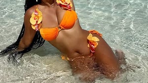 1008-Halle-Bailey-Orange-Bikini-HERO