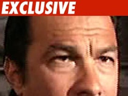 0825_steven_segal_ex-1