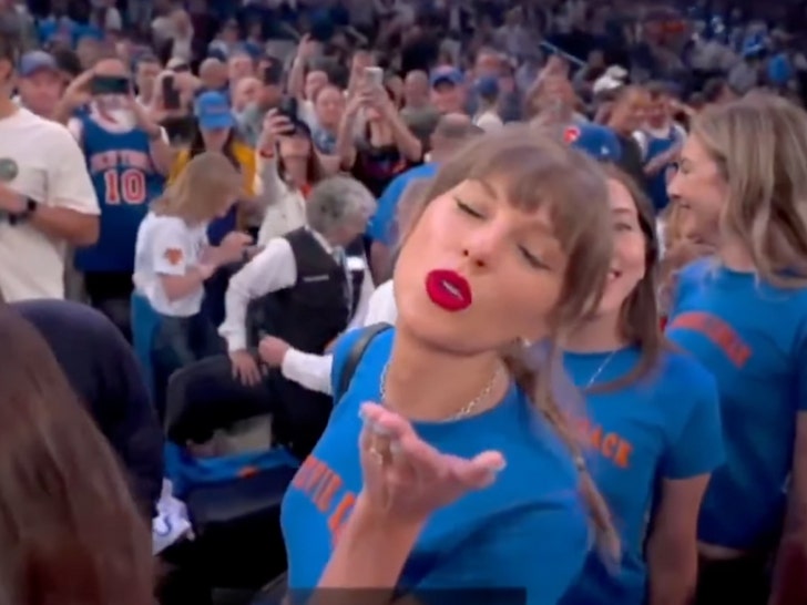 taylor swift blowing kiss Courtesy of NBA
