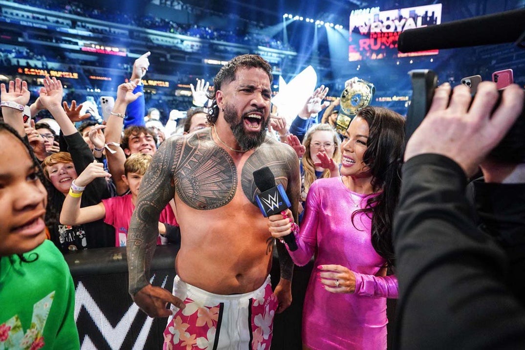 Jey Uso celebrates in the crowd with fans after his Rumble win!