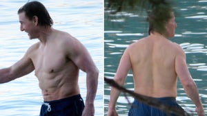 Tom Cruise Shows Off Ripped Bod On Spanish Beach Amid New Film Talks