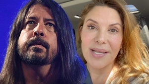 dave grohl and Kari Wuhrer getty insta 1