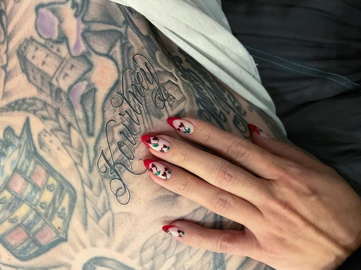 0418-travis kourtney tattoo ig