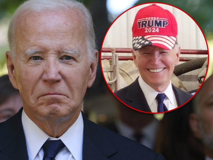 President Biden Wears Trump Hat For Unity, White House Says