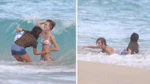 Victoria's Secret Model -- Takes a Pounding In Heavy Surf (VIDEO)