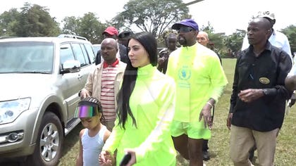 Kanye West Hands Out Dozens of Yeezys in Uganda