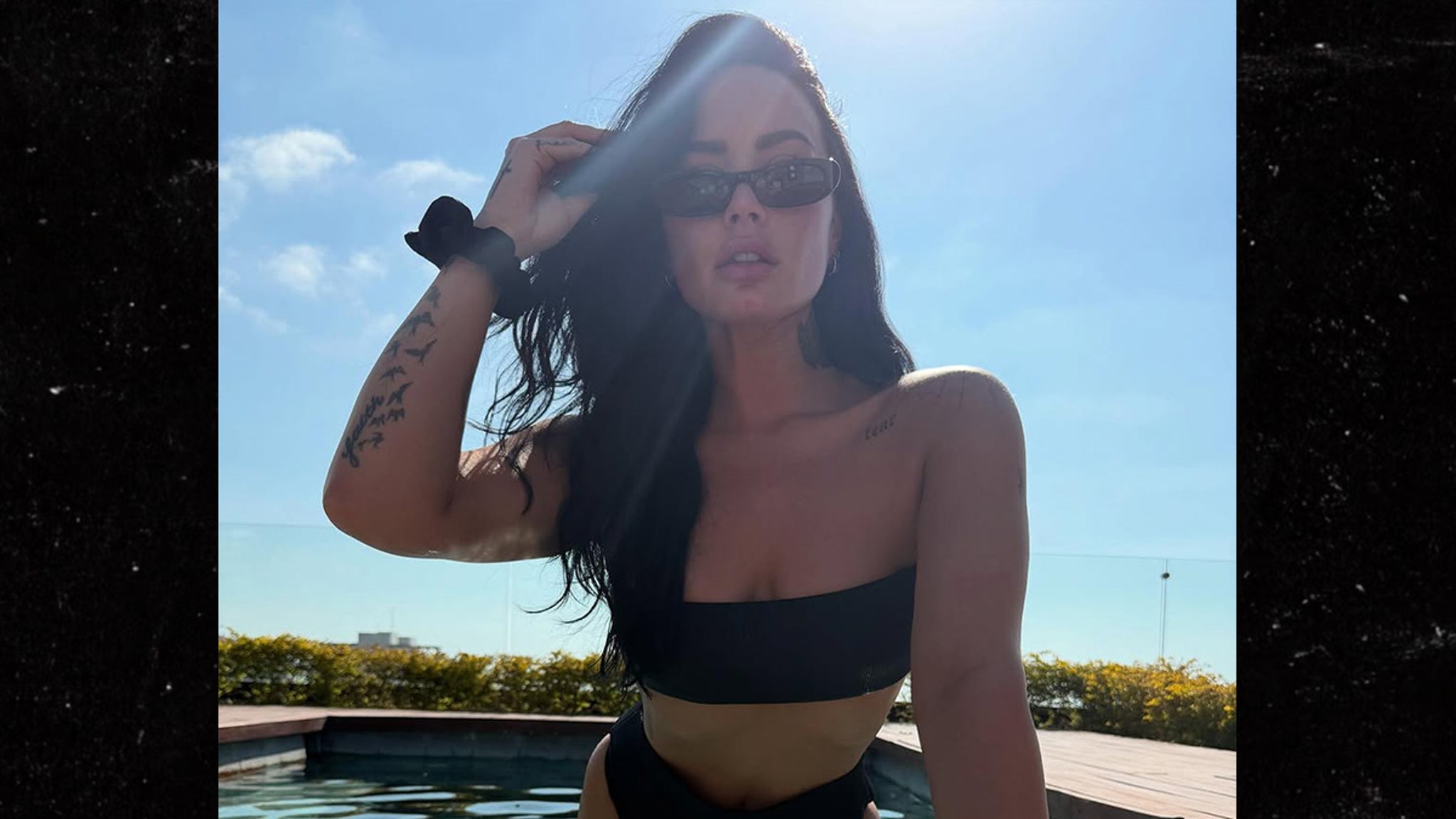 Demi Lovato Sizzles in New Black Bikini Pics, Takes Dip in Pool