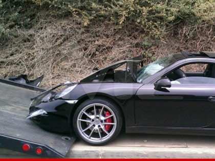 0612_lindsay_lohan_porsche_tow_tmz