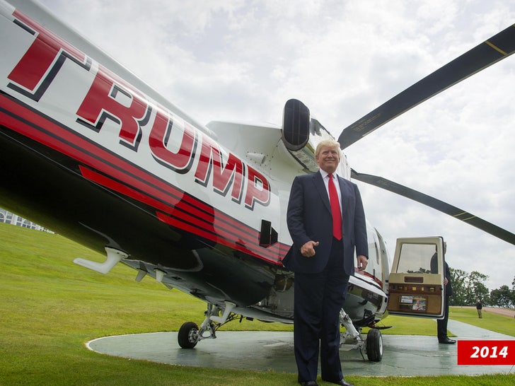trump with helicopter at turnberry resort