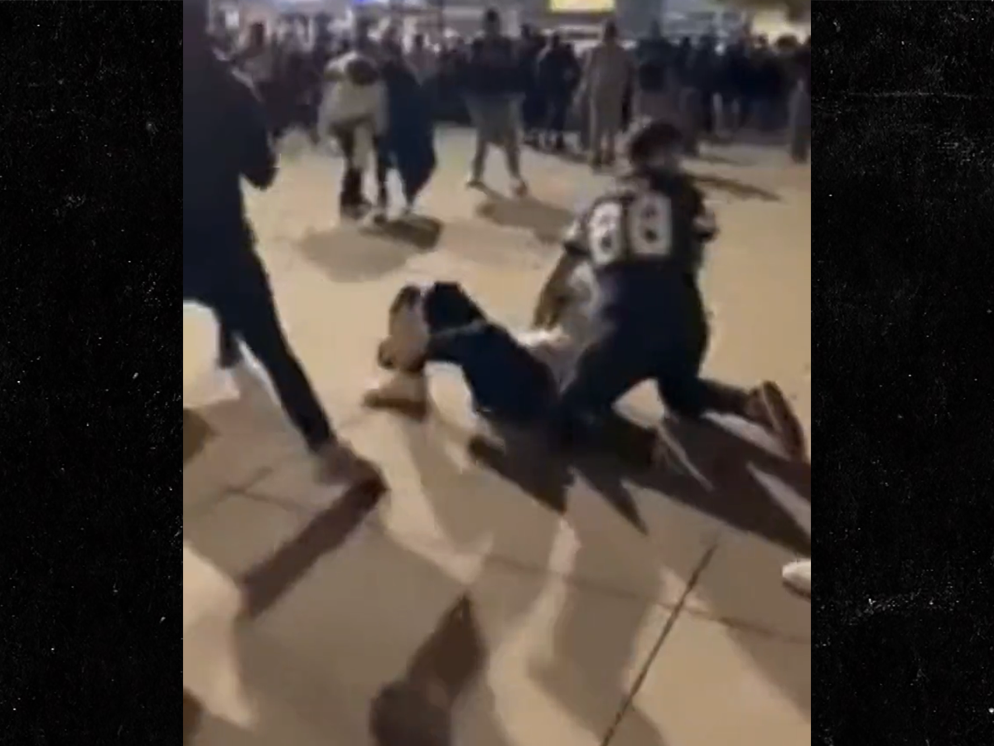 WATCH: Furious Cowboys supporters jump a fan following their