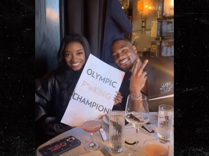 Simone Biles Poses with 'Olympic F***ing Champion' Menu