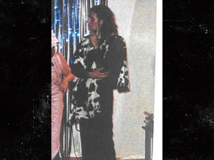 russel brand black and white coat metropolitan police 2