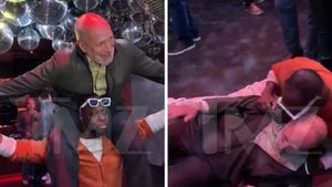 Wyclef Jean Drops Jaguar Land Rover N.A. CEO from Shoulders at After-Party