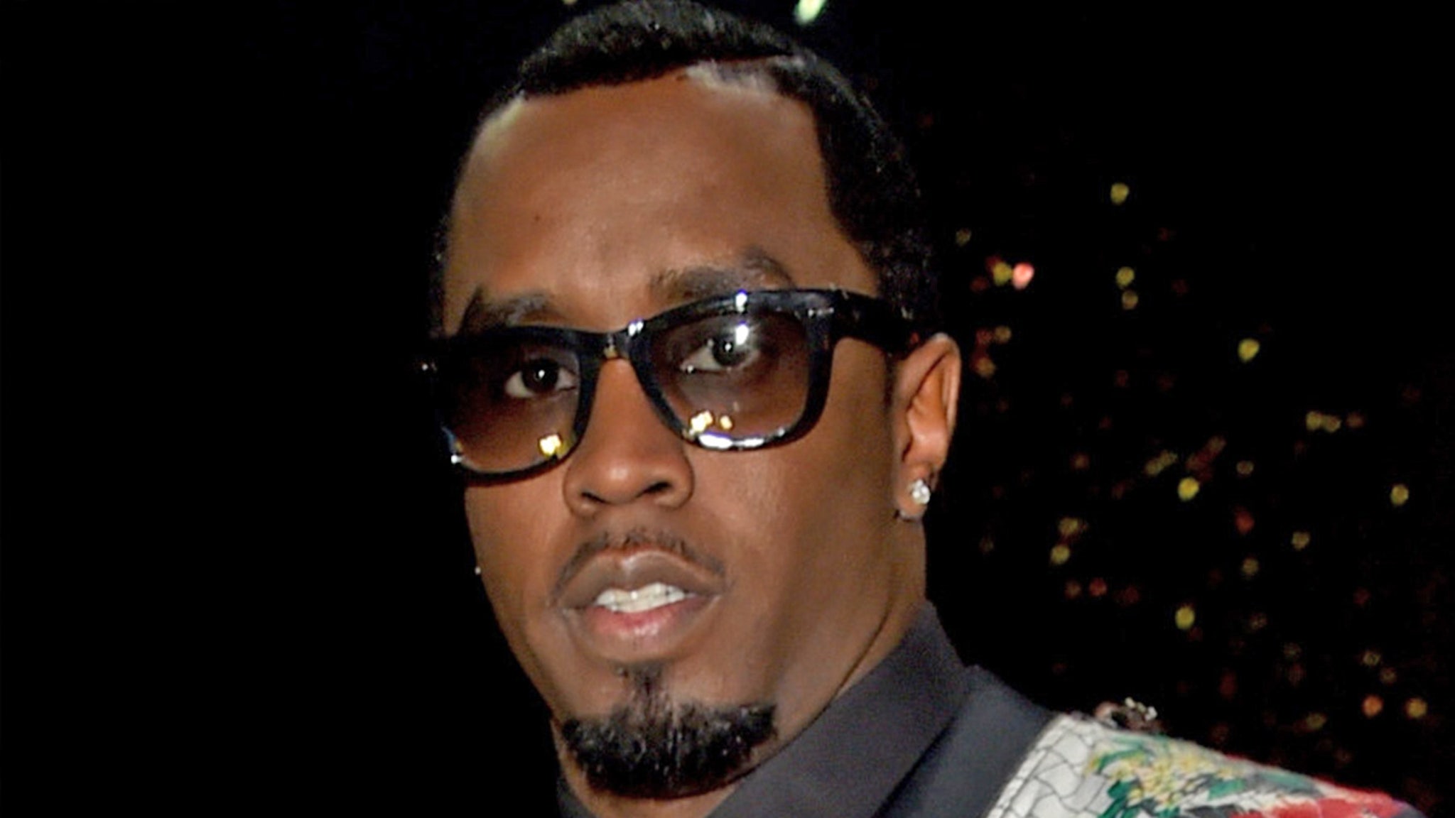 Diddy Sued By Woman Who Claims He Dangled Her Off Balcony