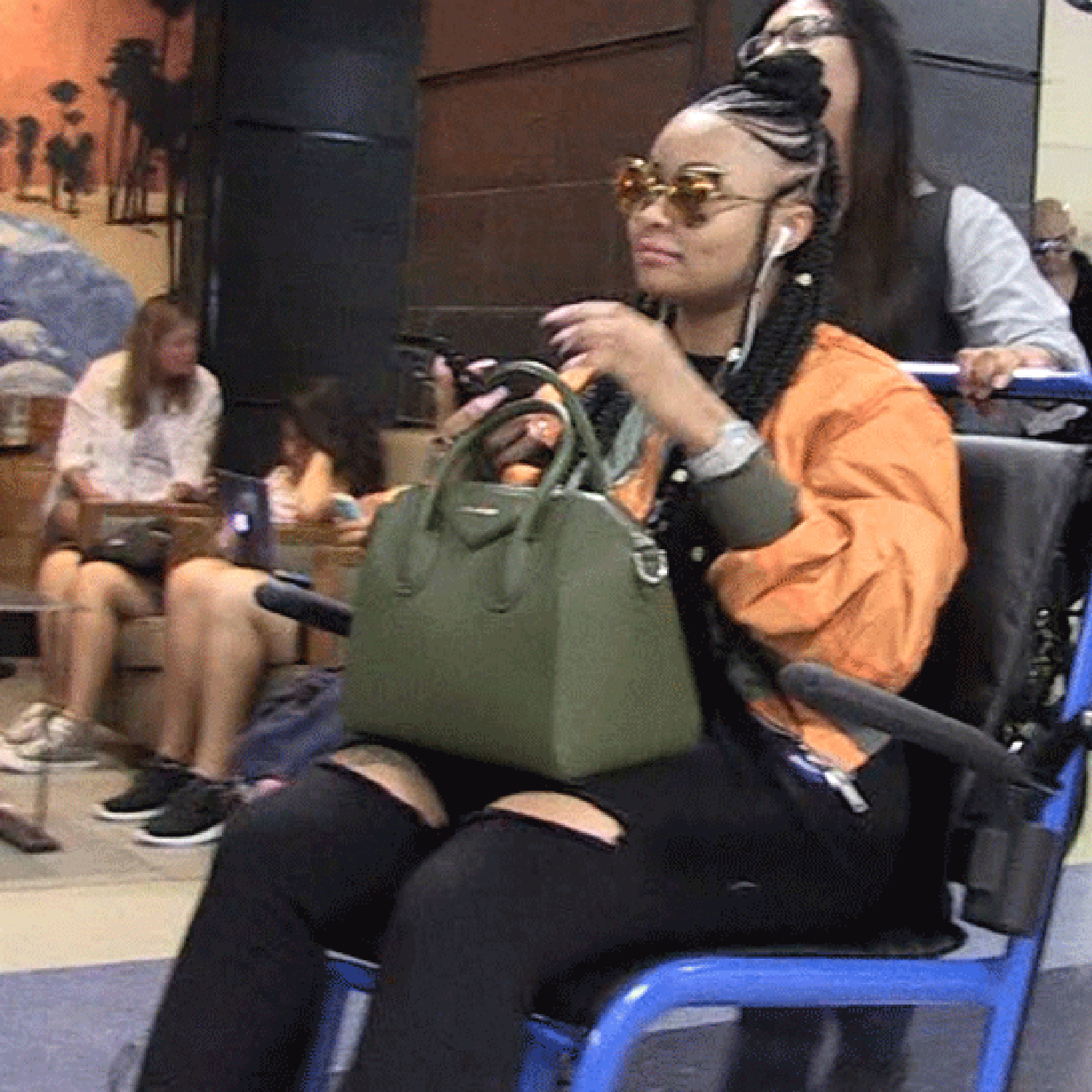 Blac Chyna Leaves LAX with Wheelchair Assist