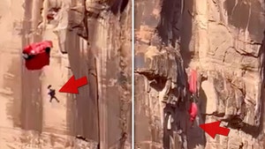 Base Jumper Slams Into Cliff, Dangles Above Ground In Death Defying Video