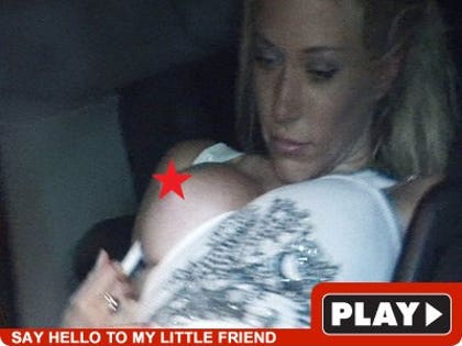 Kendra Wilkinson: Click to watch