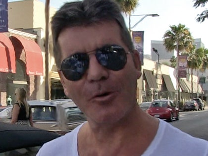 1216_simon_cowell_TMZ_2b