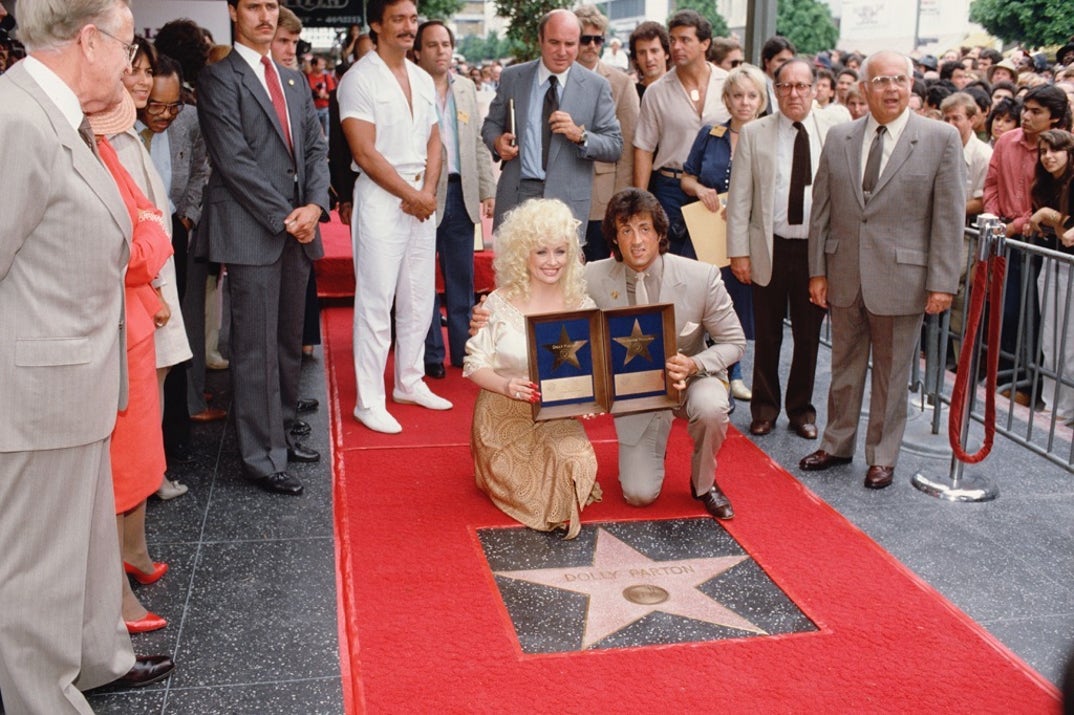 Dolly Parton and Sylvester Stallone