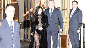 Kim Kardashian Rocks Leopard Print Suits for Paris Fashion Week