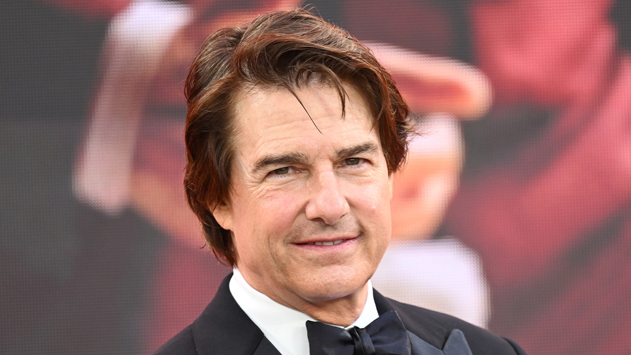 Tom Cruise Surprises Woman Doomscrolling at Work, on Video