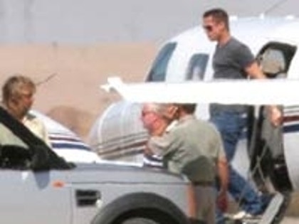 Brad Pitt gets off his private jet