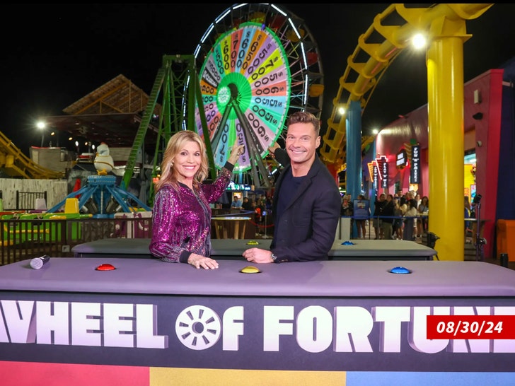 Vanna White Ryan Seacrest Wheel of Fortune