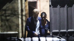 Meghan Markle's Baby Bump Front & Center on Night Out with Prince Harry
