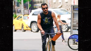 Justin Theroux Takes Britney Spears for Ride on Muscle Tee