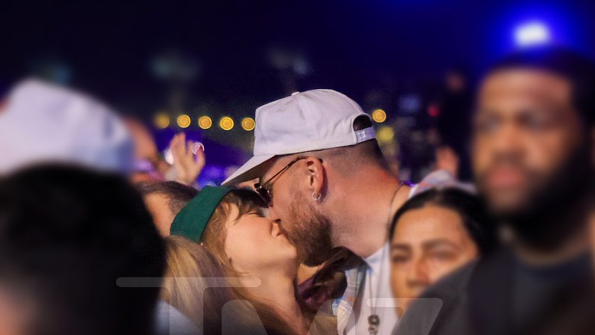 New Photos of Taylor and Travis Kissing in Middle of Coachella Crowd