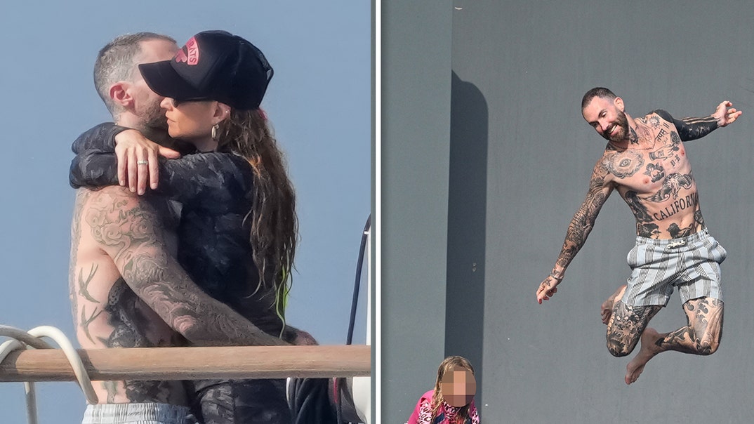 gallery-launch-Adam-Levine-and-Behati-Prinsloo-backgrid-1