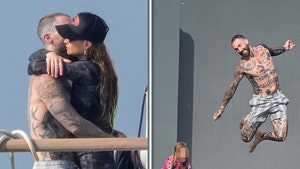 gallery-launch-Adam-Levine-and-Behati-Prinsloo-backgrid-1