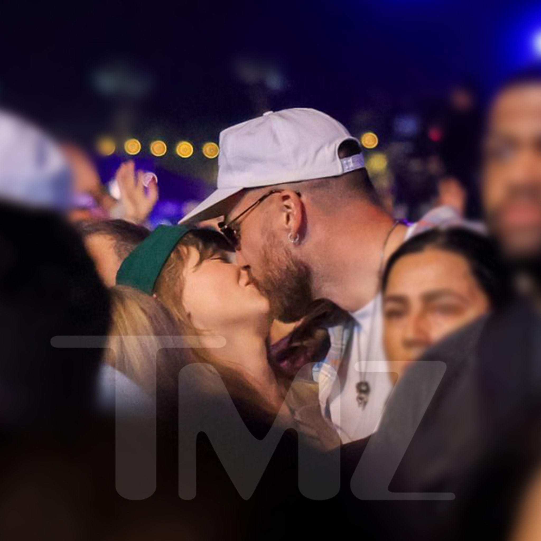 New Photos of Taylor and Travis Kissing in Middle of Coachella Crowd