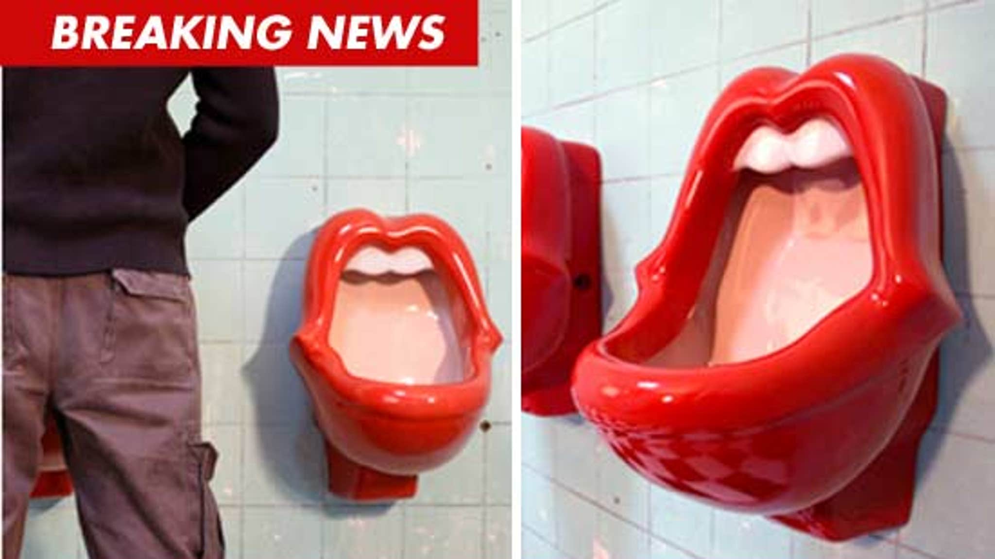 Feminists see red over urinals like open mouths