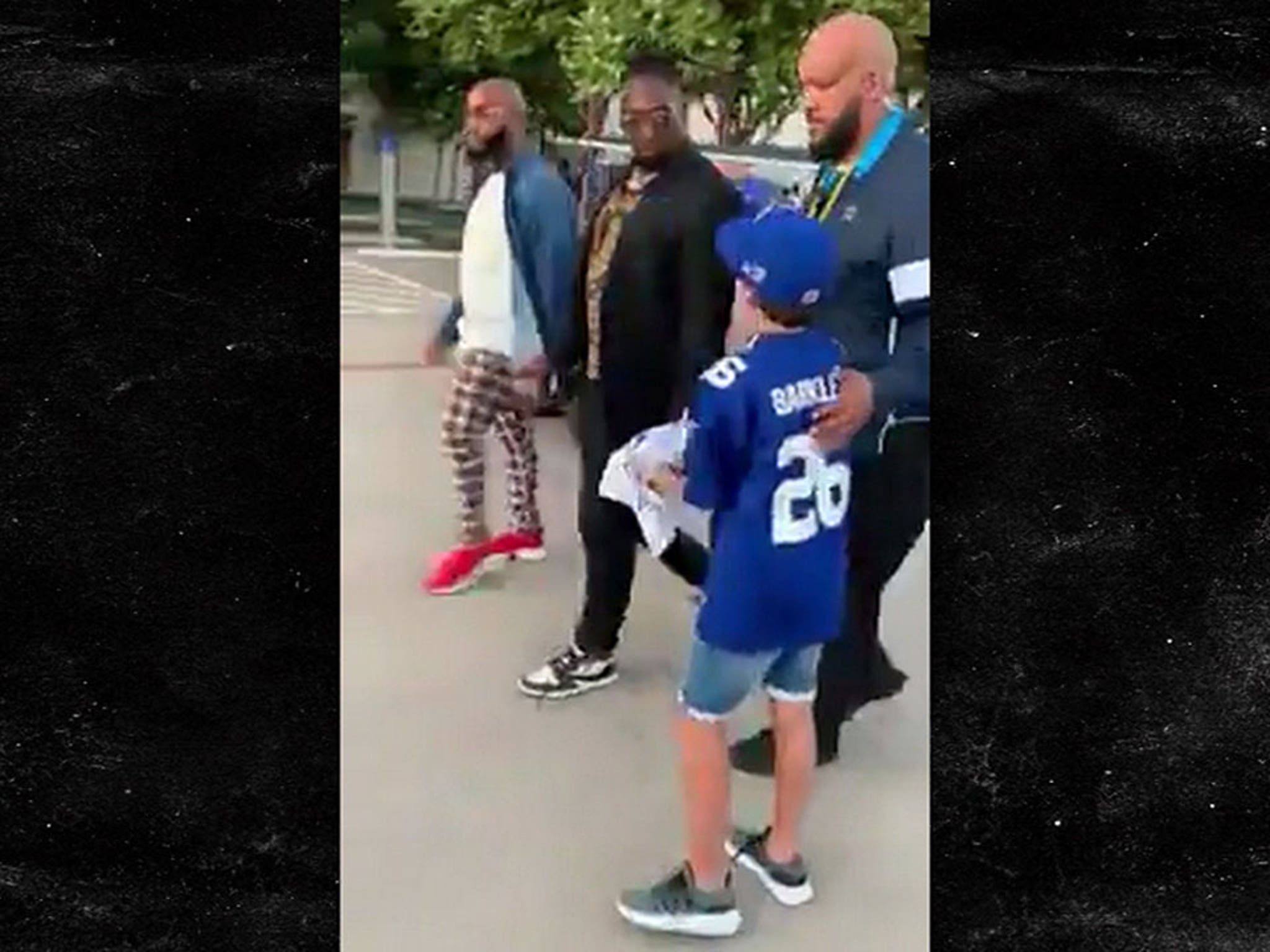NFL's DeMarcus Lawrence Defends Roasting Kid, 'Get The Right Jersey, Son!'