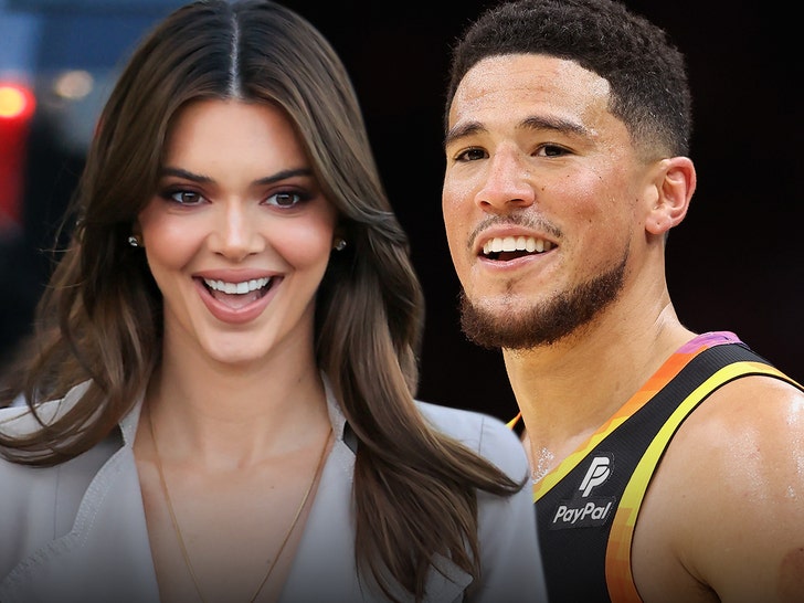 Kendall Jenner and Devin Booker smiling.