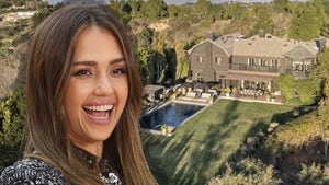 Jessica Alba Beside An Aerial Photo Of Her Beverly Hills Home
