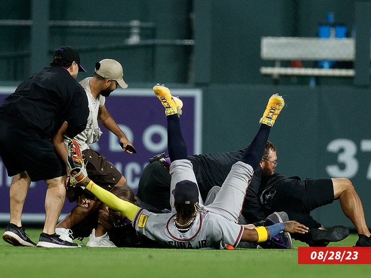 WATCH: Ronald Acuña Jr. Knocked To Ground by Fans Who Stormed
