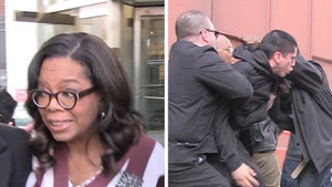 Oprah Rushed Away By Security When Fight Breaks Out Next to Her (VIDEO)