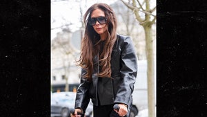 Victoria Beckham Forced to Use Crutches During Paris Fashion Week