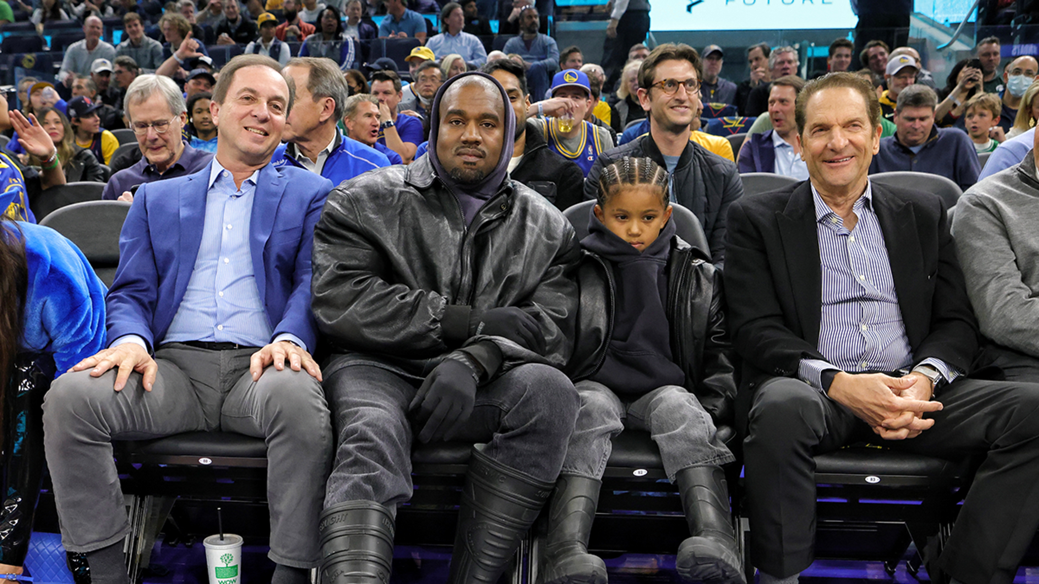 Kanye West Smiling Courtside with Saint Amid 24-Hour Instagram Ban
