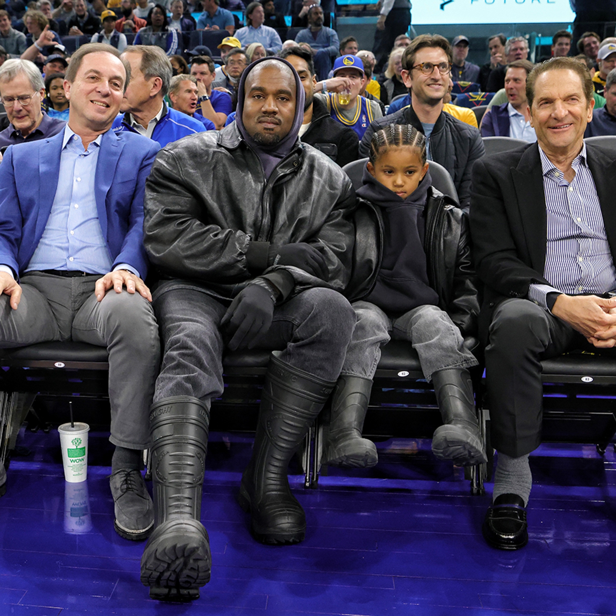 Kanye West Smiling Courtside with Saint Amid 24 Hour Instagram Ban