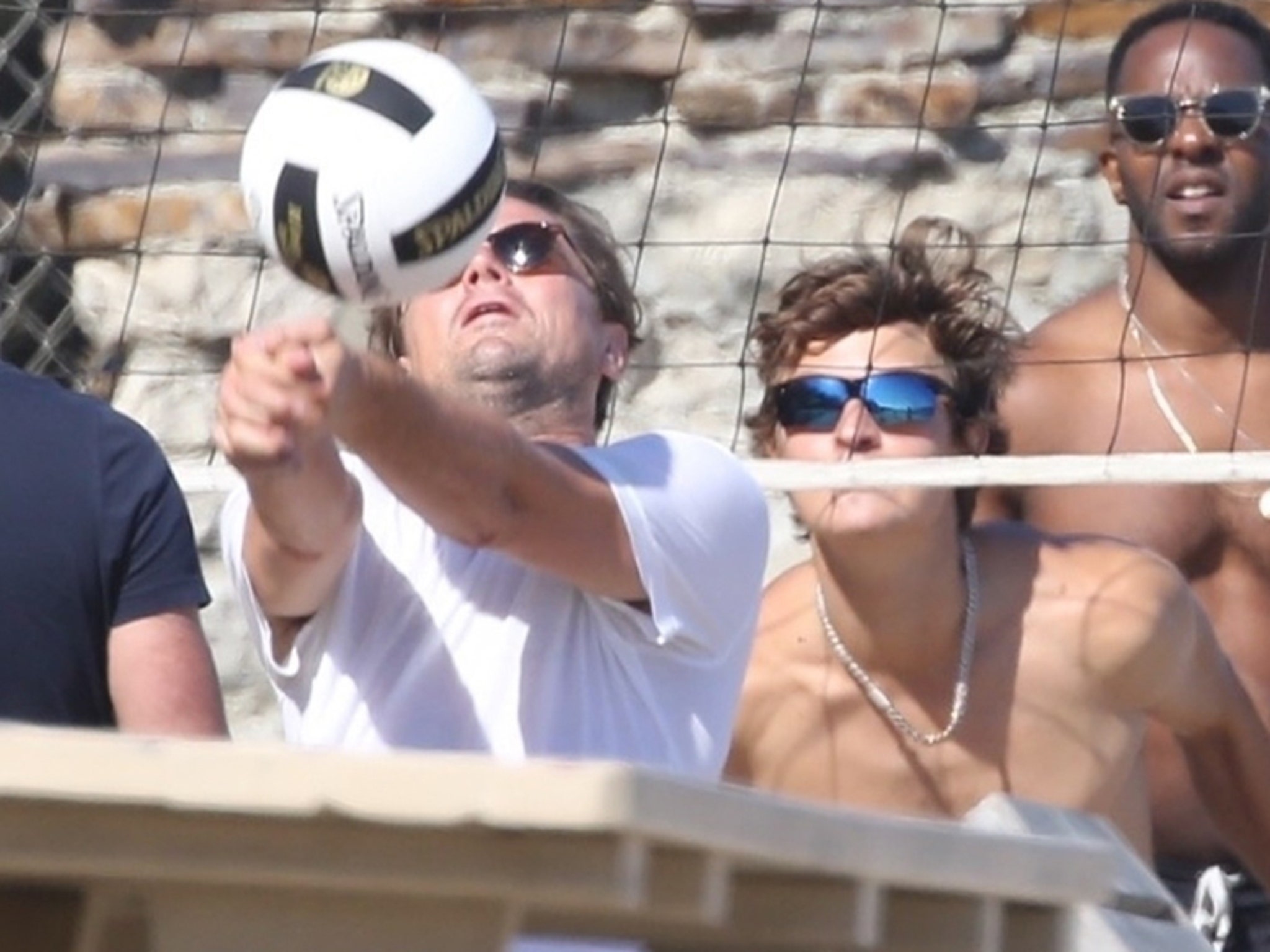 Leonardo DiCaprio Plays Beach Volleyball With Ansel Elgort
